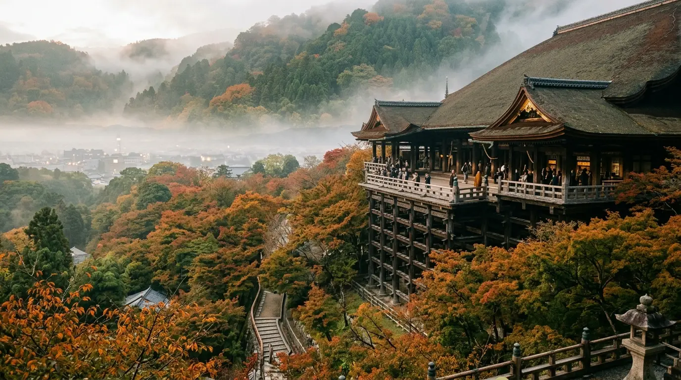 The soaring wooden stage of Kiyomizu-dera temple cantilevering gracefully over lush mountain maple groves.